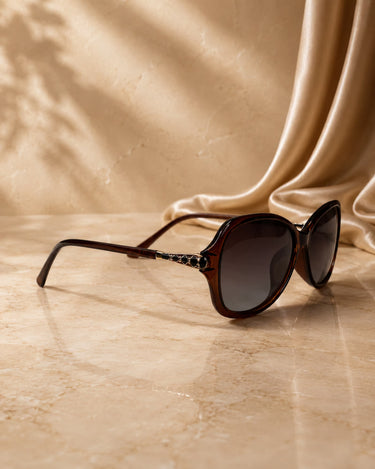 Female model wearing Amber sunglasses from Intimates